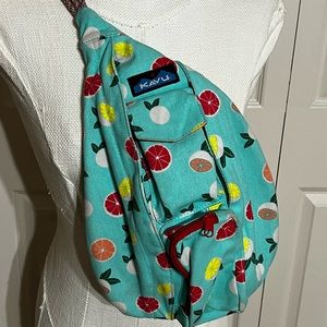 Kavu small swing backpack. Practically new. Fruit pattern over light blue.